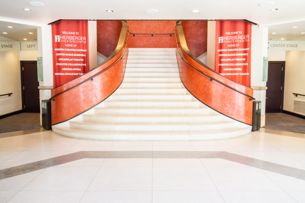image of herberger lobby with stairs ascending at center